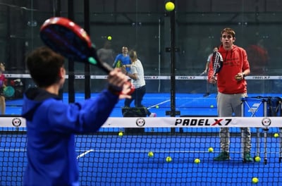1-on-1 padel coaching session focused on technique improvement