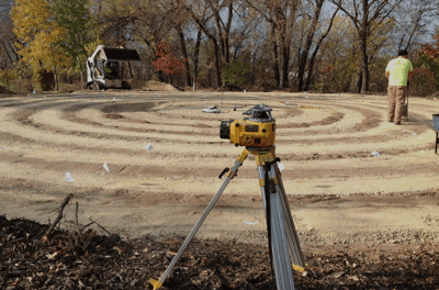 a man standing in a circular maze maze maze