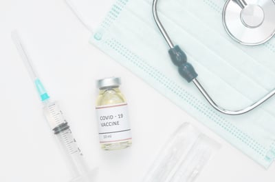 a stethoscope, mask, injection for medical supplies