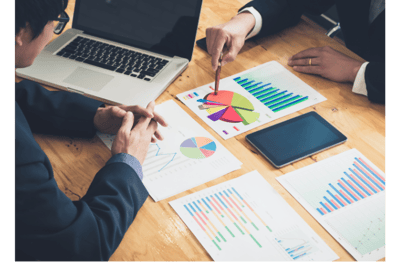 Export consultancy meeting with strategic planning documents on the table – Zyncopra foreign trade s