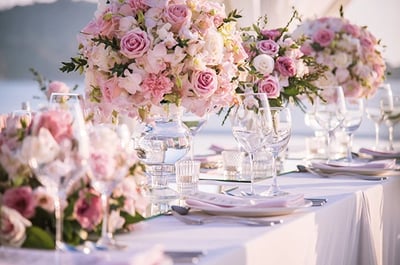 a table with a bunch of flowers on it