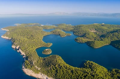 View of a Croatian island with crystal-clear sea and Mediterranean nature