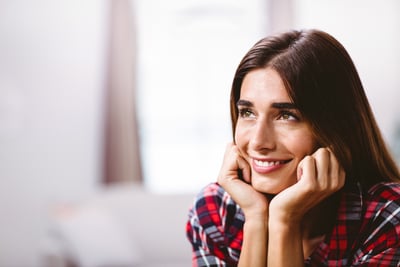 a woman with a plaid shirt and a plaid shirt