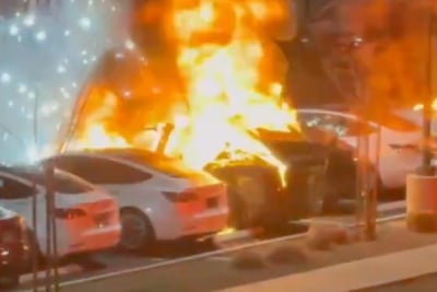 Burning the cars the "Bad Man" built