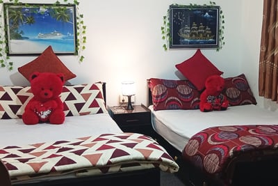 Double beds at Nobel Bungalow Nuwara Eliya – comfortable family room setup