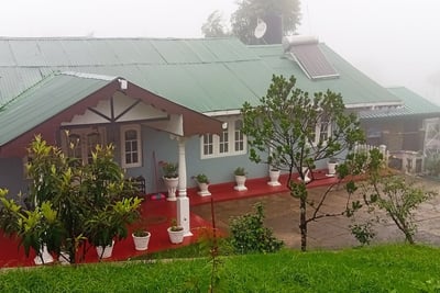 Misty morning view of Nobel Bungalow Nuwara Eliya – peaceful holiday home with garden view
