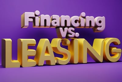 A sign that says: "financing vs. leasing"