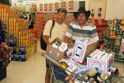 Janne and Carl with full shopping trolley in Darwin, Australia 