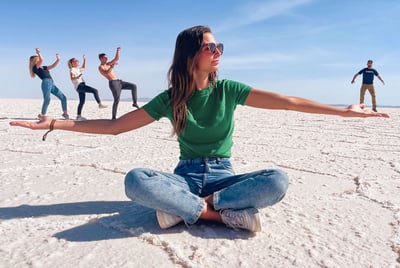 Funny photo on the Uyuni Salt Flat where Marine is holding us in her arms, using perspective play.