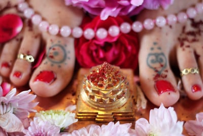 woman's feet being worshiped in tantra