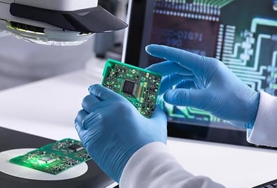 Omini conducts manual visual inspections in PCB assembly for precise quality control.