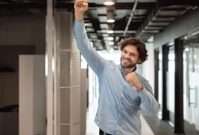 a man with a fist up