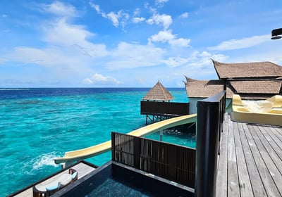 ozen reserve bolifushi overwater villa slide
