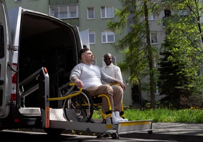 a man in a wheelchair with a wheelchair in a wheelchair