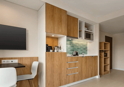 The studio's equipped kitchenette and dining table at Wyndham Residences Alvor Beach