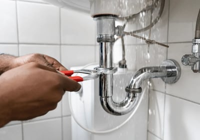 Plumber fixing a leak in Jodhpur
