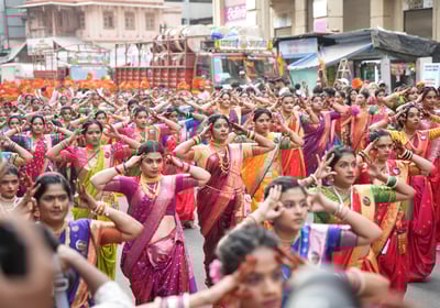 women in maharastrian traditional outfit performing in girgaon gudipadwa shobhayatra 2025