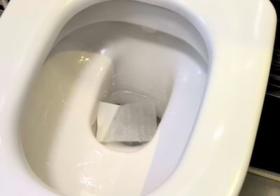100% dissolvable toilet cleaning sheet dissolving in water