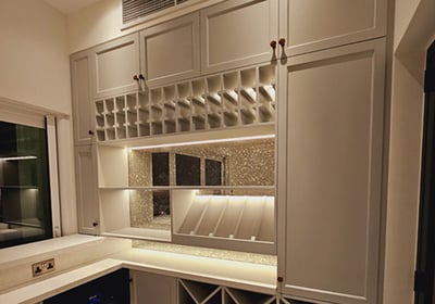 a kitchen with a wine rack and wine rack