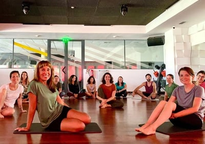 Group photo of Portimao Digital Nomads community members at a yoga session