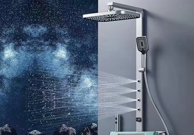 a shower with a shower head and a shower head