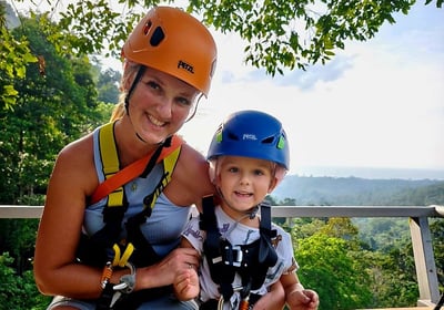 a woman and a child on a zipline hawk adventure koh samui zipline