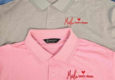 Custom embroidered pink and gray polos with Malu loves shoes logo – personalized business apparel by