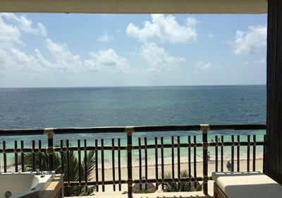 a balcony with a view of the ocean