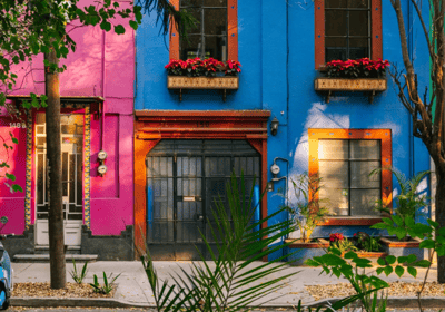 Colorful buildings in Mexico – vibrant local culture near top fertility clinics.