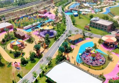 a large amusement park with a large playground area