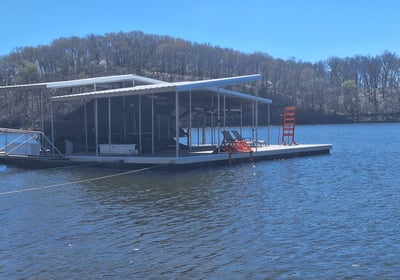 a boat on a lake with a boat in the water