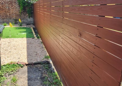 Installed and stained this beautiful vertical fence.