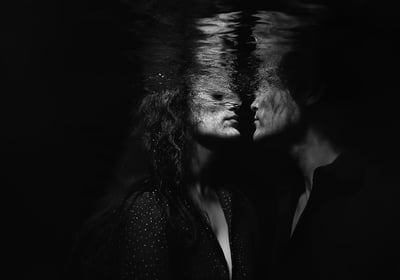Artistic underwater portrait symbolizing creative editing and AI-enhanced photo services