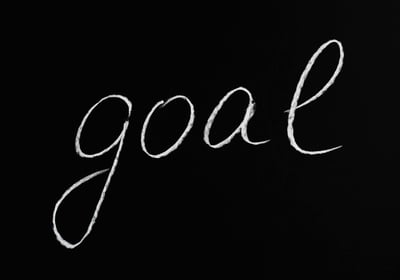 le mot goal sur fond noir pour atteindre des objectifs