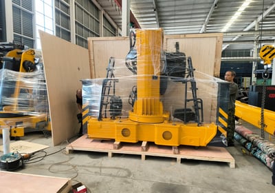 We pack your 12-ton truck mounted crane parts with stretch wrap & wood crating for reinforced, secure international export.