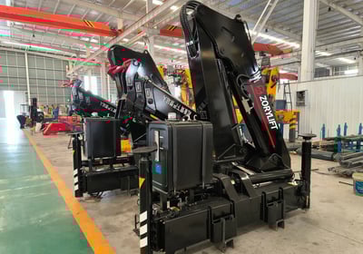 Zorylift SQZ132A.2: Black 6.3t knuckle boom (truck/lorry) hydraulic crane. Folded articulated structure.