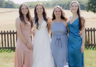 Bride photographed with her friends at a UK summer wedding