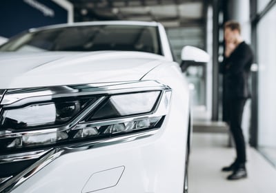 White car and a man
