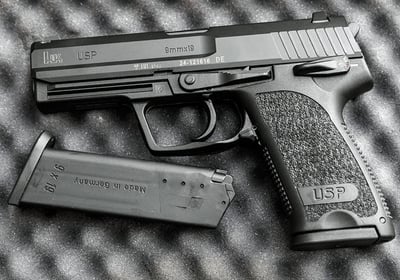 H&K Pistol with magazine resting on top of foam padding