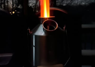 a rocket stove device to aid in cooking and boiling water