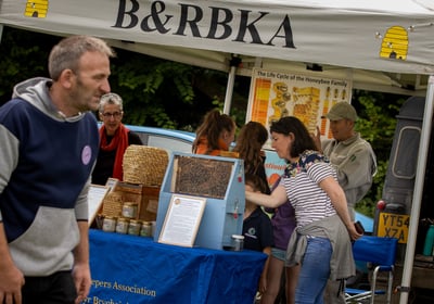 A local business advertising their products at Cwmdu Agricultural show