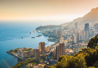 a cityscape of Monaco and the sea