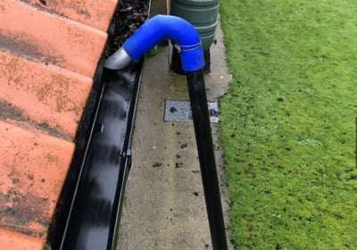 professional gutter clean being preformed for a local customer