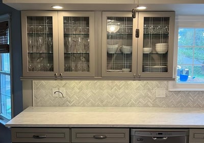 a kitchen with a stove top and a stove top