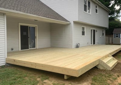 a deck with a wooden deck and a large deck