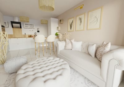 a living room with a couch and a ottoman