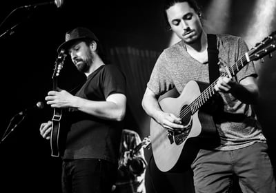 andrew brantley on stage acoustic guitar