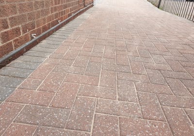 After photo of a professionally jetwashed block paving driveway in Hull, showing restored colour and