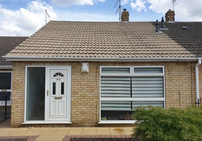 After photo of a bungalow roof in Hull, professionally jetwashed to remove moss and grime, revealing clean roof tiles