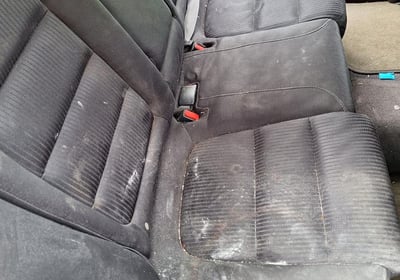 a car seat with a seatbelt and a seat belt